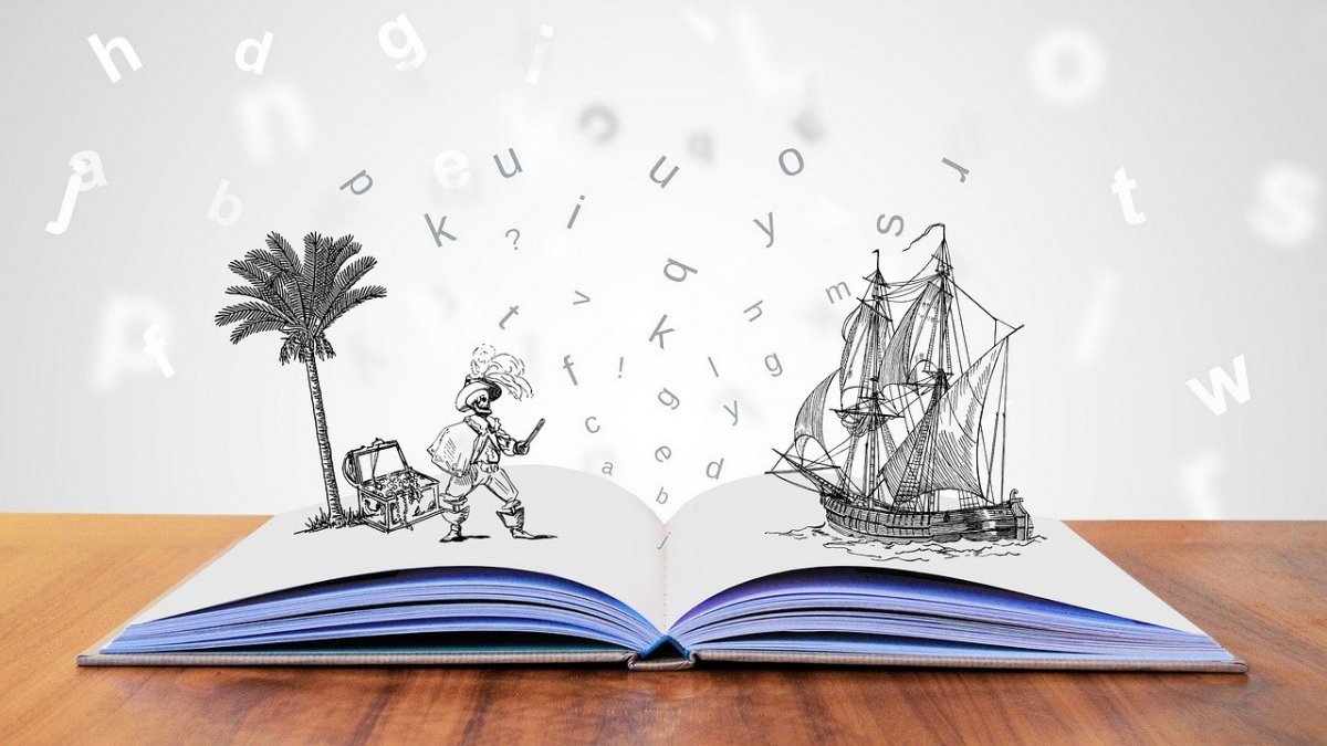 Open book with cartoons of a boat